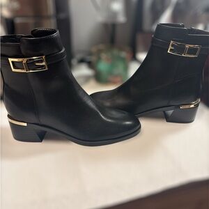 NWOT Calvin Klein Black Ankle Booties with Gold Accents